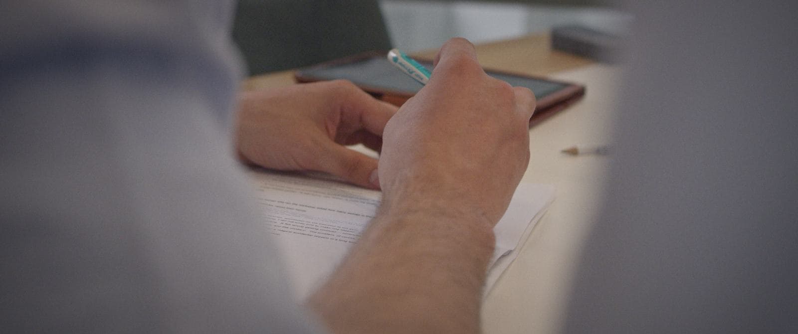 a manager writes his evaluation on RFI/RFP papers