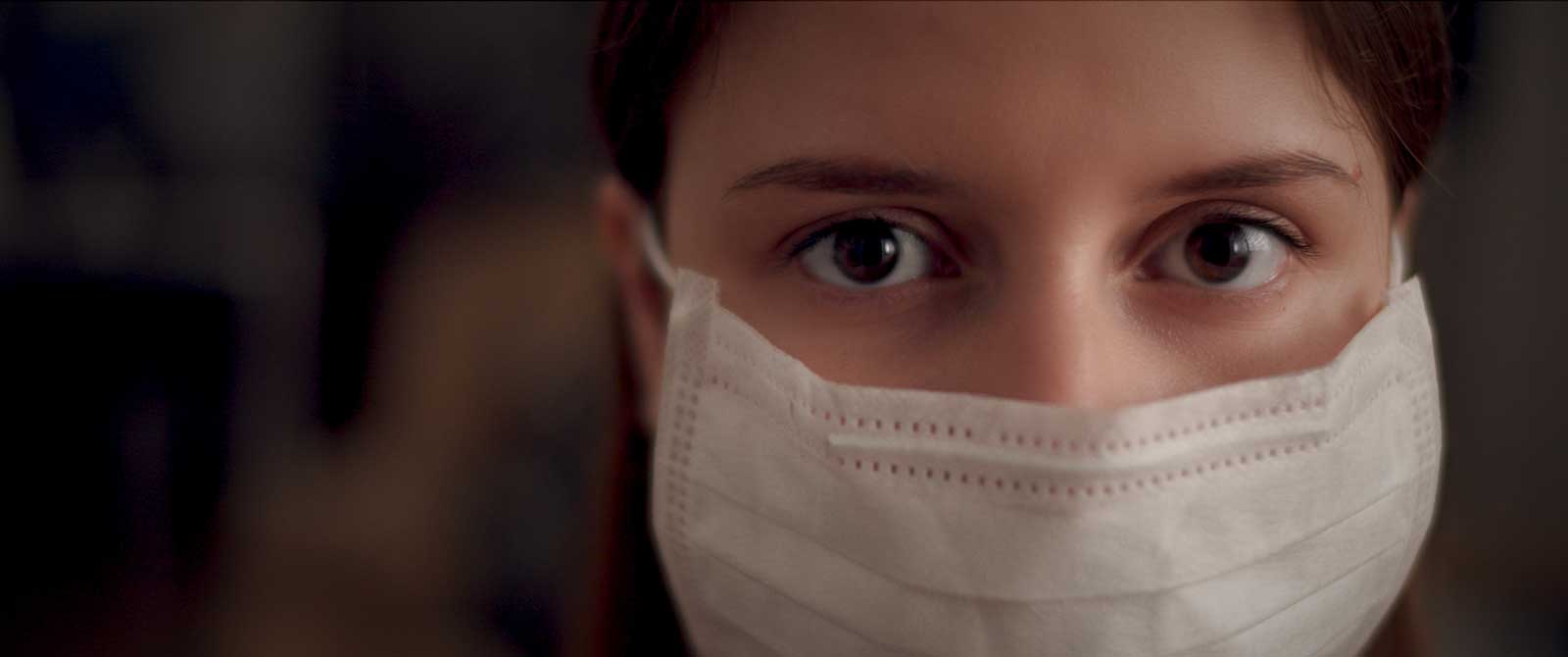 a person in facemask, worry about the supply chain challenges arise during covid pandemic